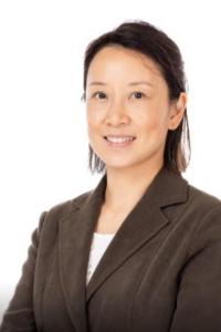 Photos of a woman wearing a dark brown suit